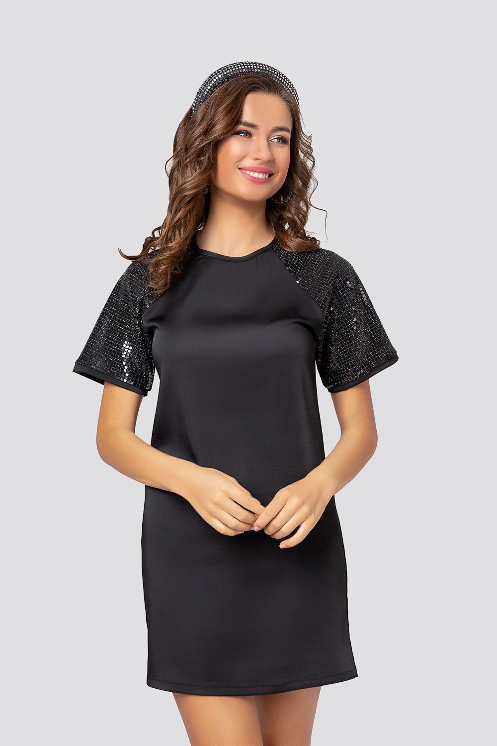 Black dress with a shiny sleeve