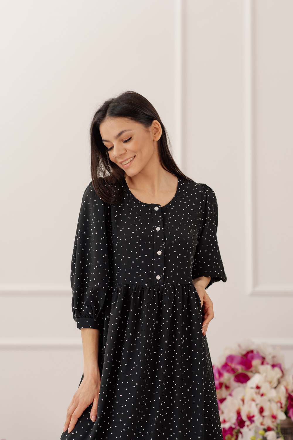Black polka dot dress with ruffle