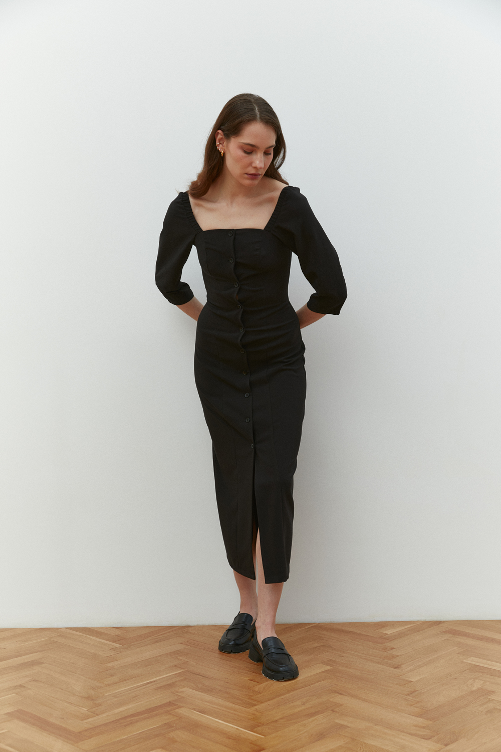 Black fitted midi dress with square neckline