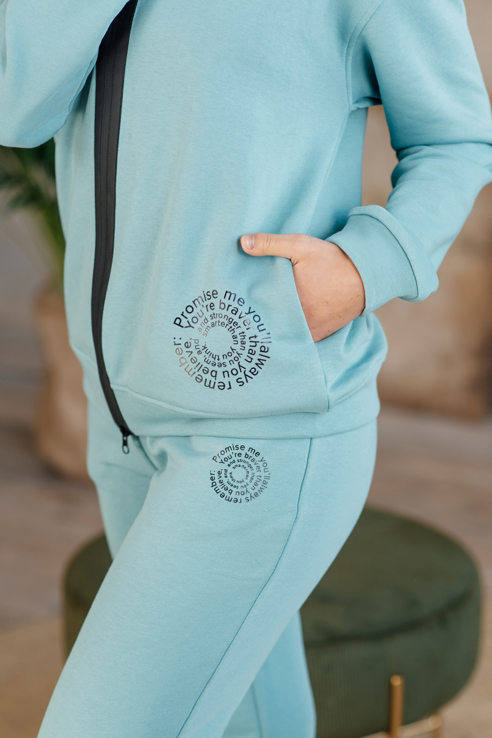 Sweatshirt with a zipper and a hood