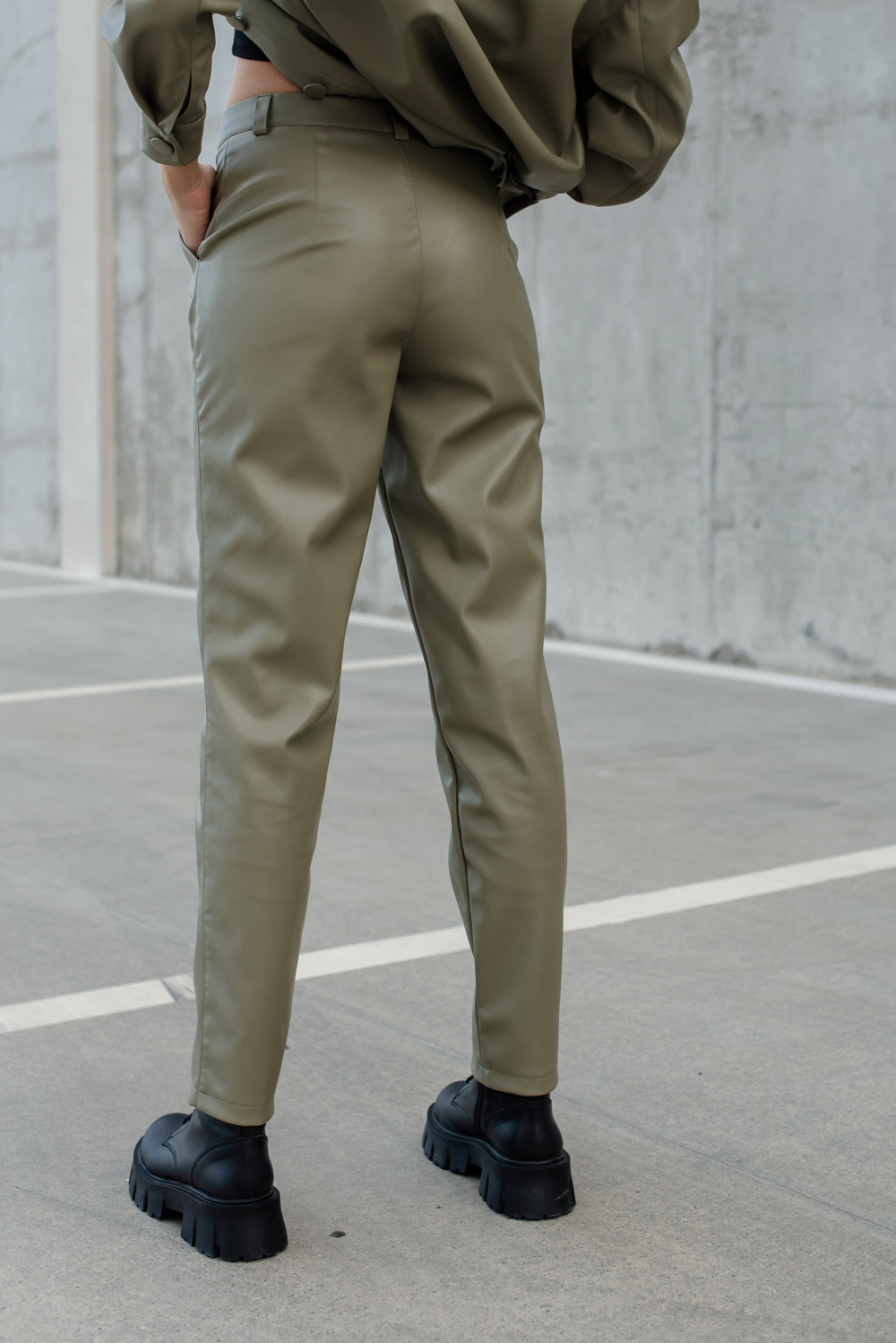 Olive eco leather trousers with arrows