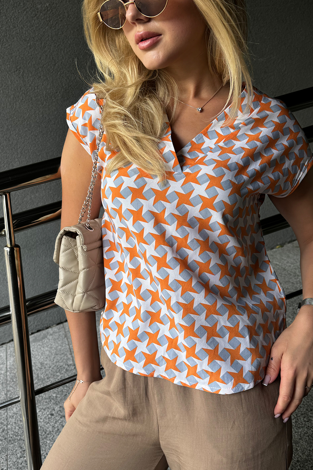 Lightweight orange staple blouse