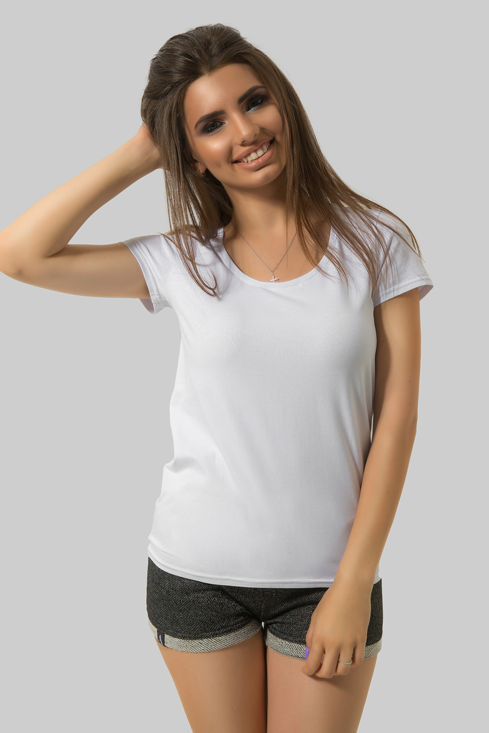 Хлопковая футболка со вставками сетки на спинке в белом цвете