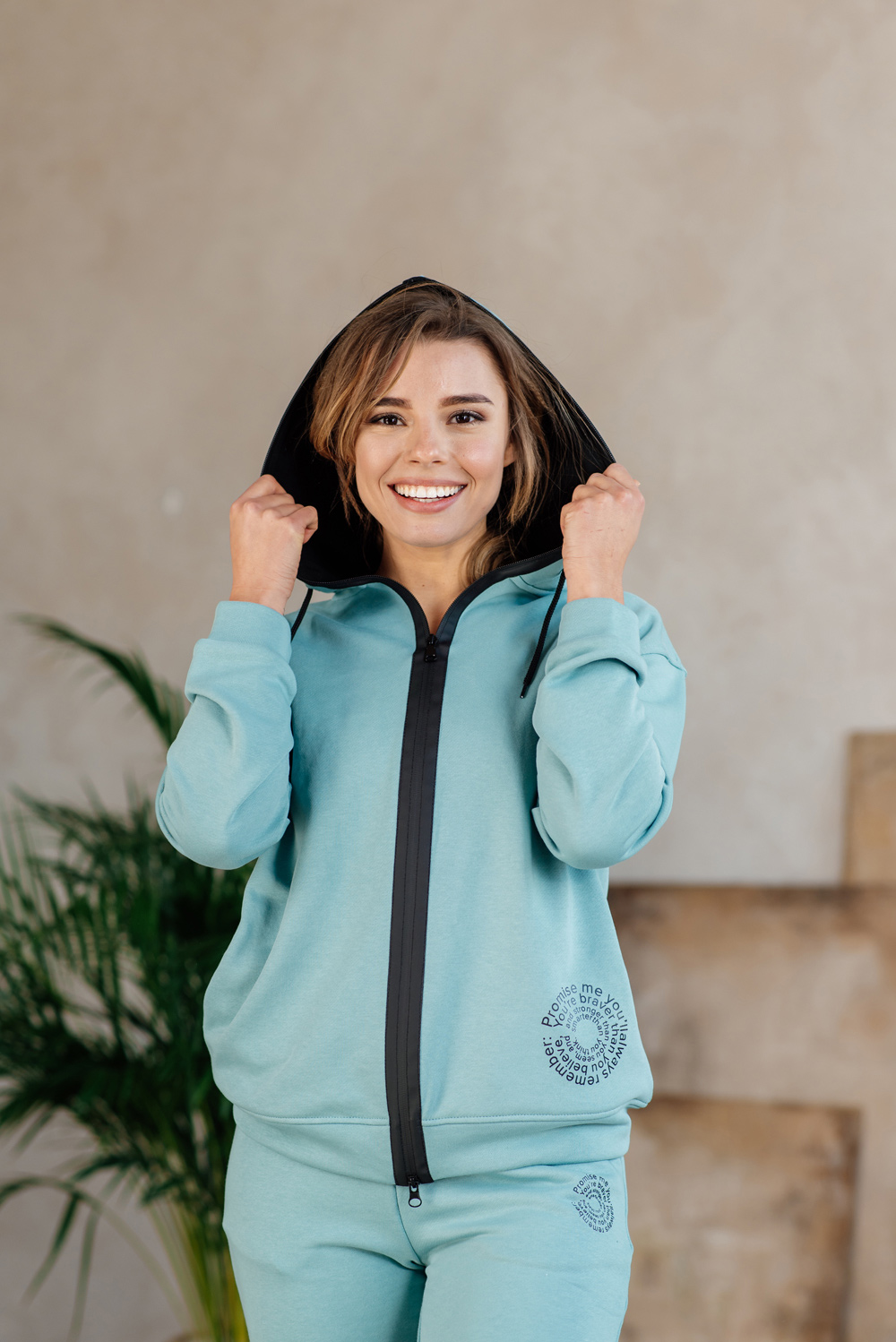 Sweatshirt with a zipper and a hood
