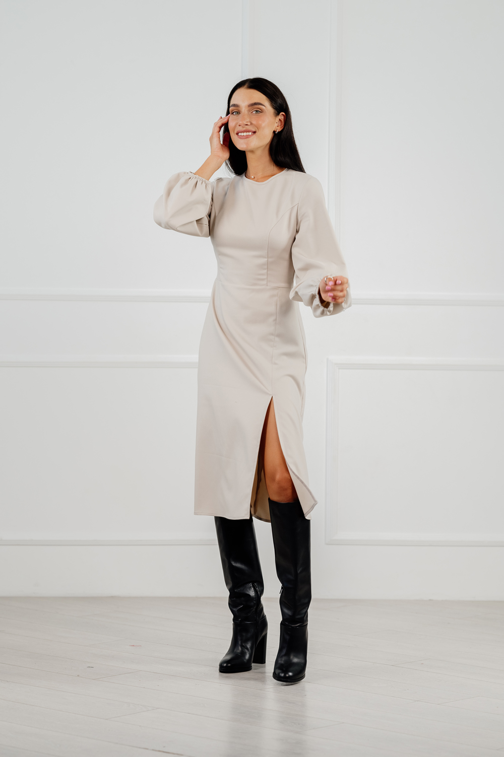 Gentle beige dress fitted cut