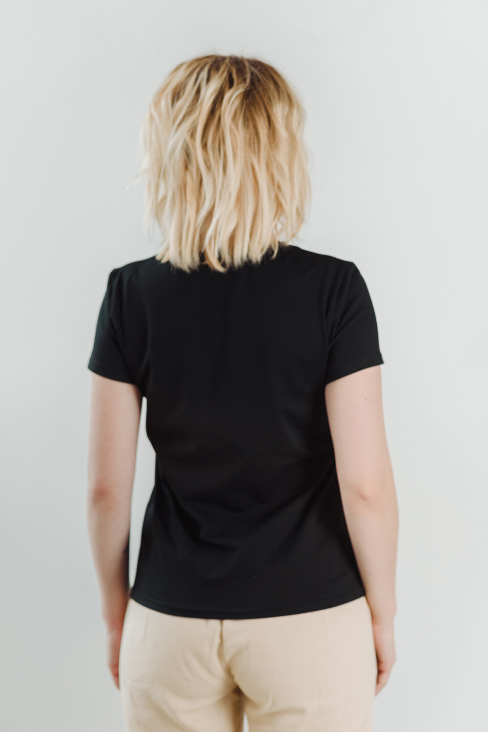 Black T-shirt with a pattern on the pocket