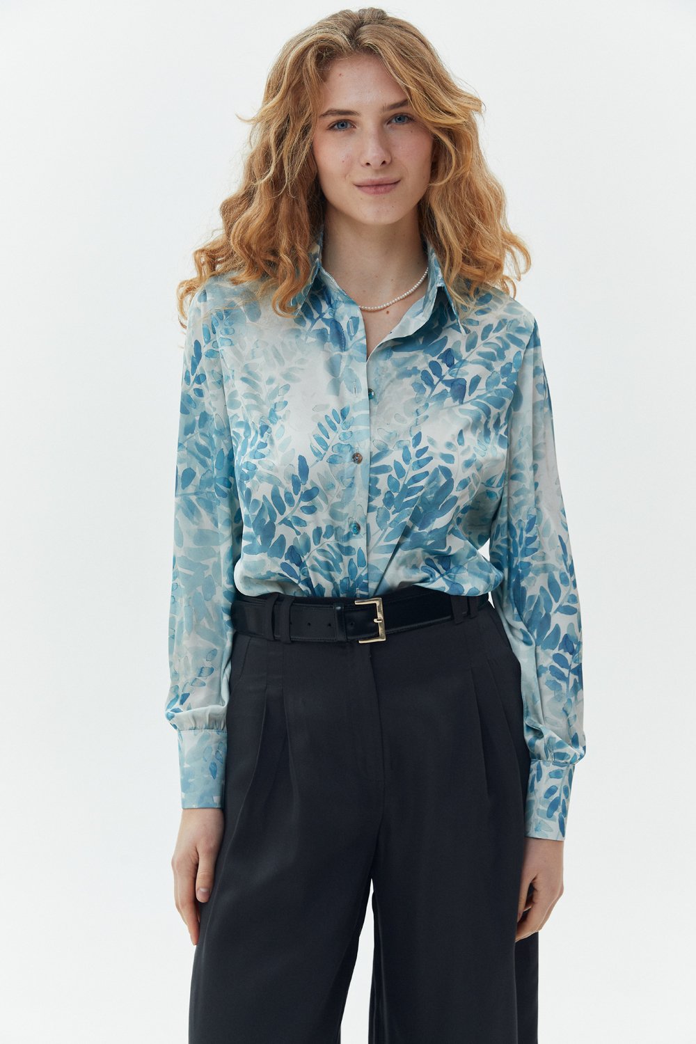 Элегантная блуза свободного кроя бирюзового цвета