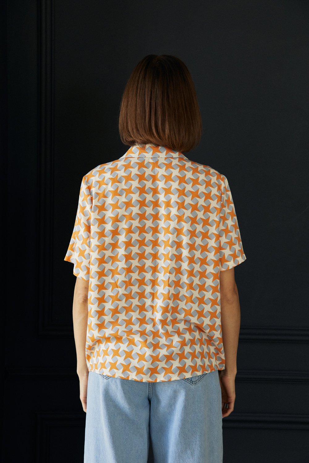 Помаранчева блуза вільного крою з короткими рукавами