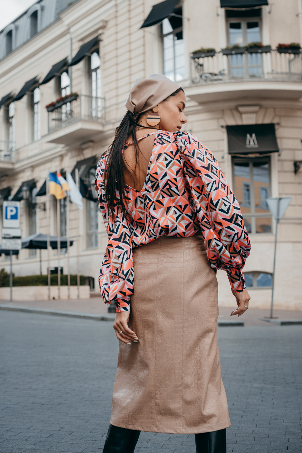 Midi skirt made of eco leather with buttons