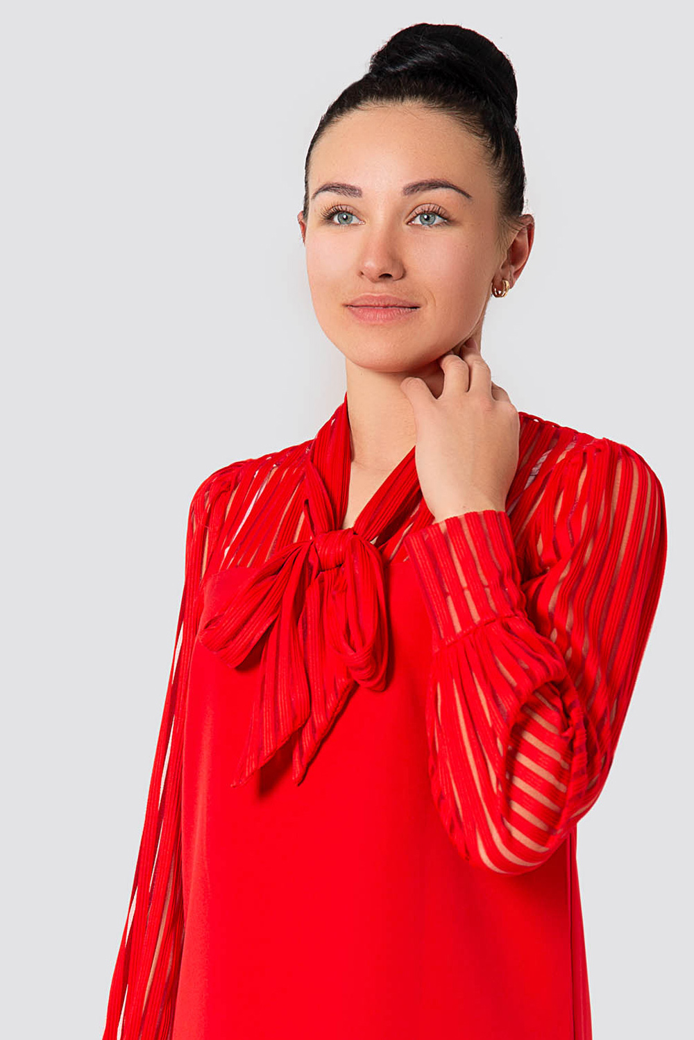 Red dress with a bow around the neck