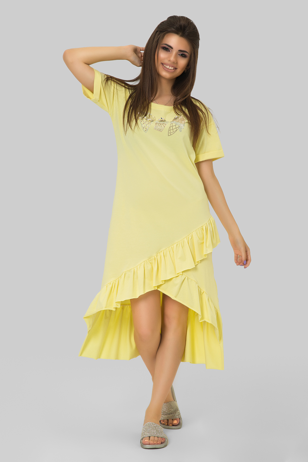 Трикотажное платье в желтом. цвете с оборкой по низу