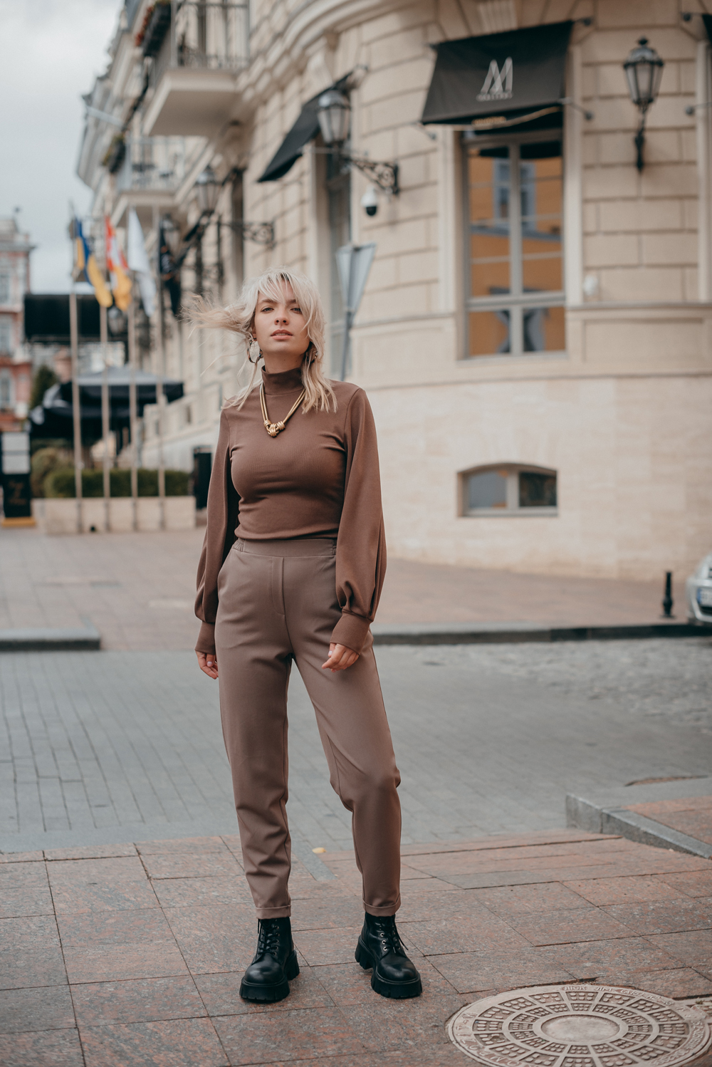 Beige elasticated trousers with cuffs