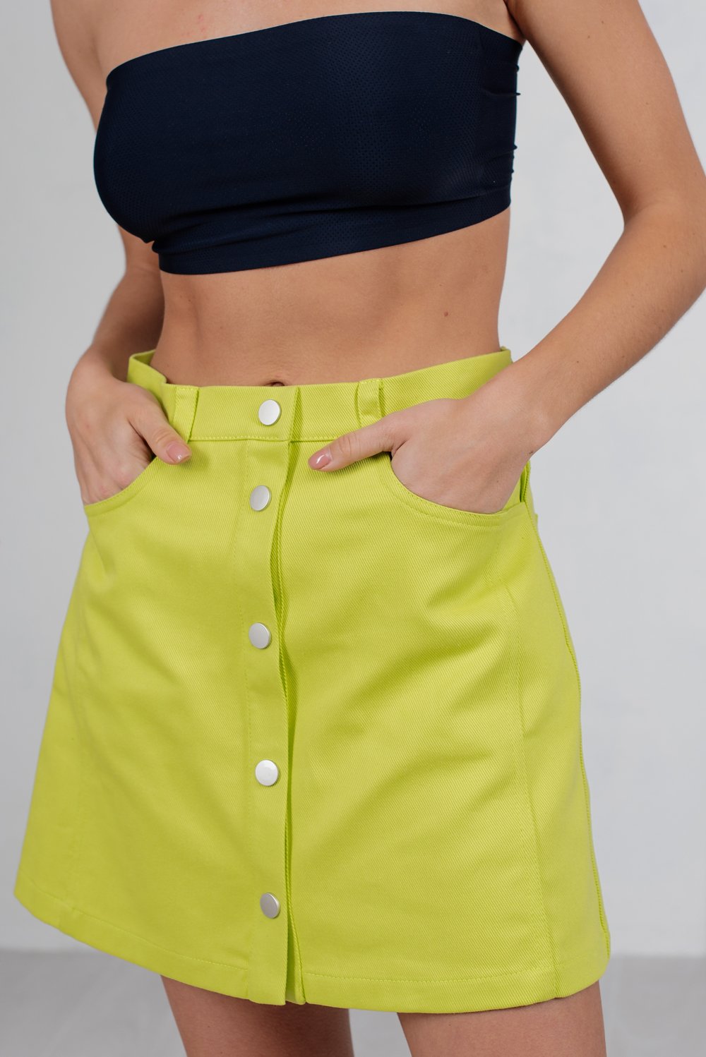Studded denim mini skirt with pockets