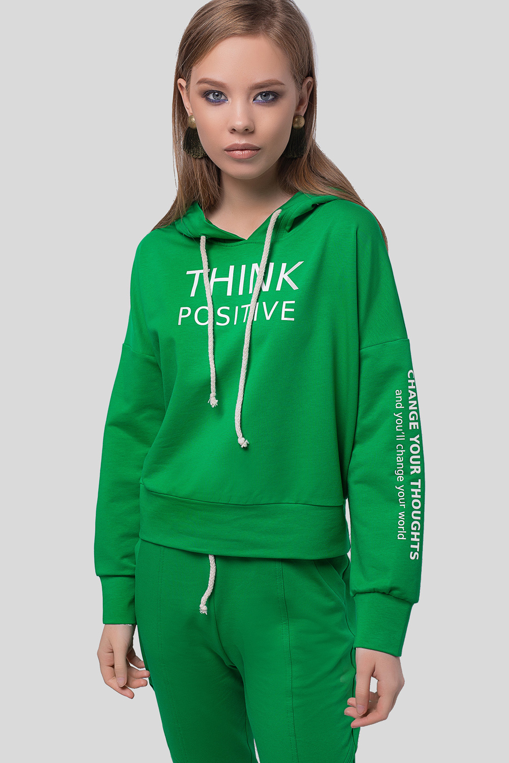 Green hoodie with a slogan