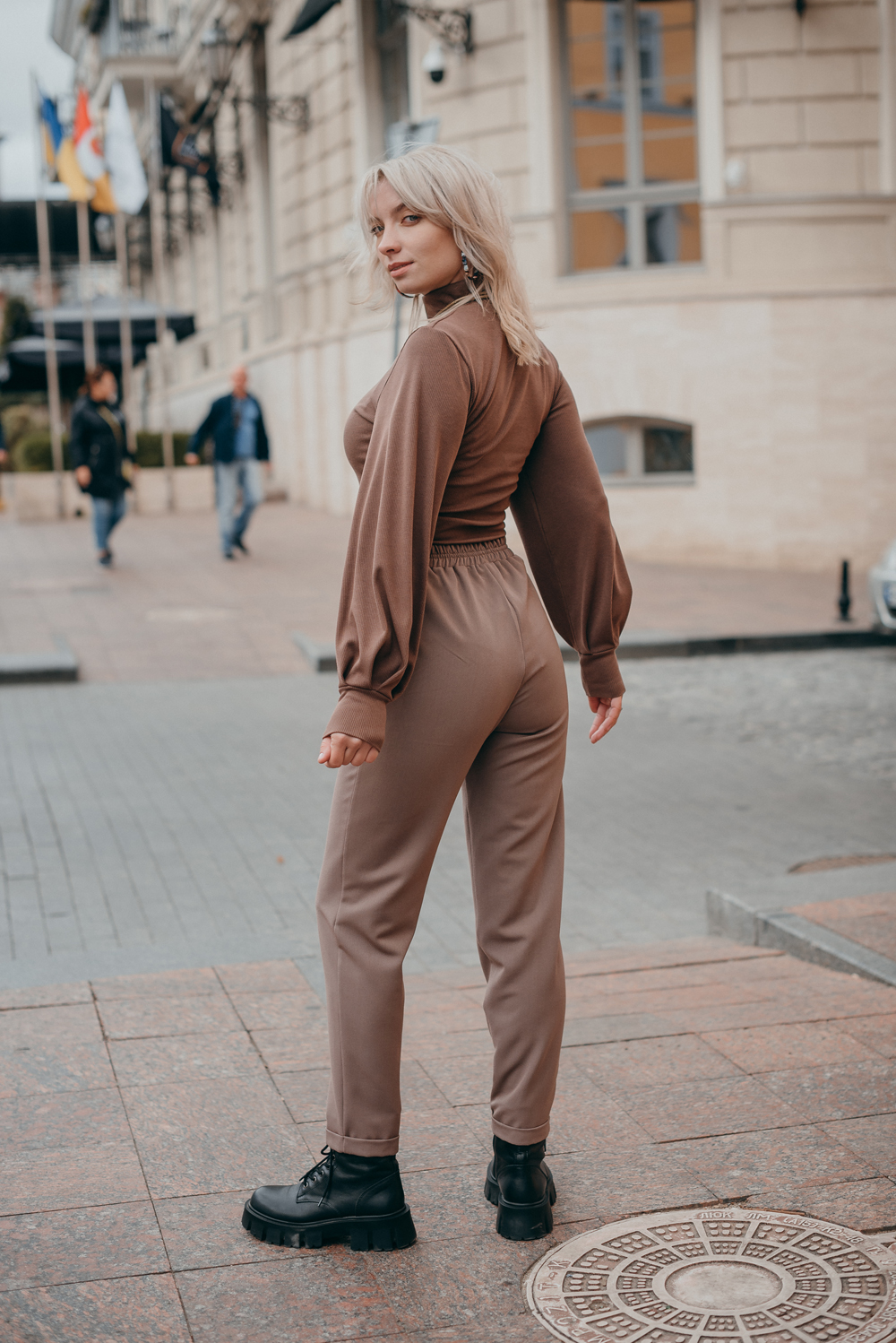 Beige elasticated trousers with cuffs