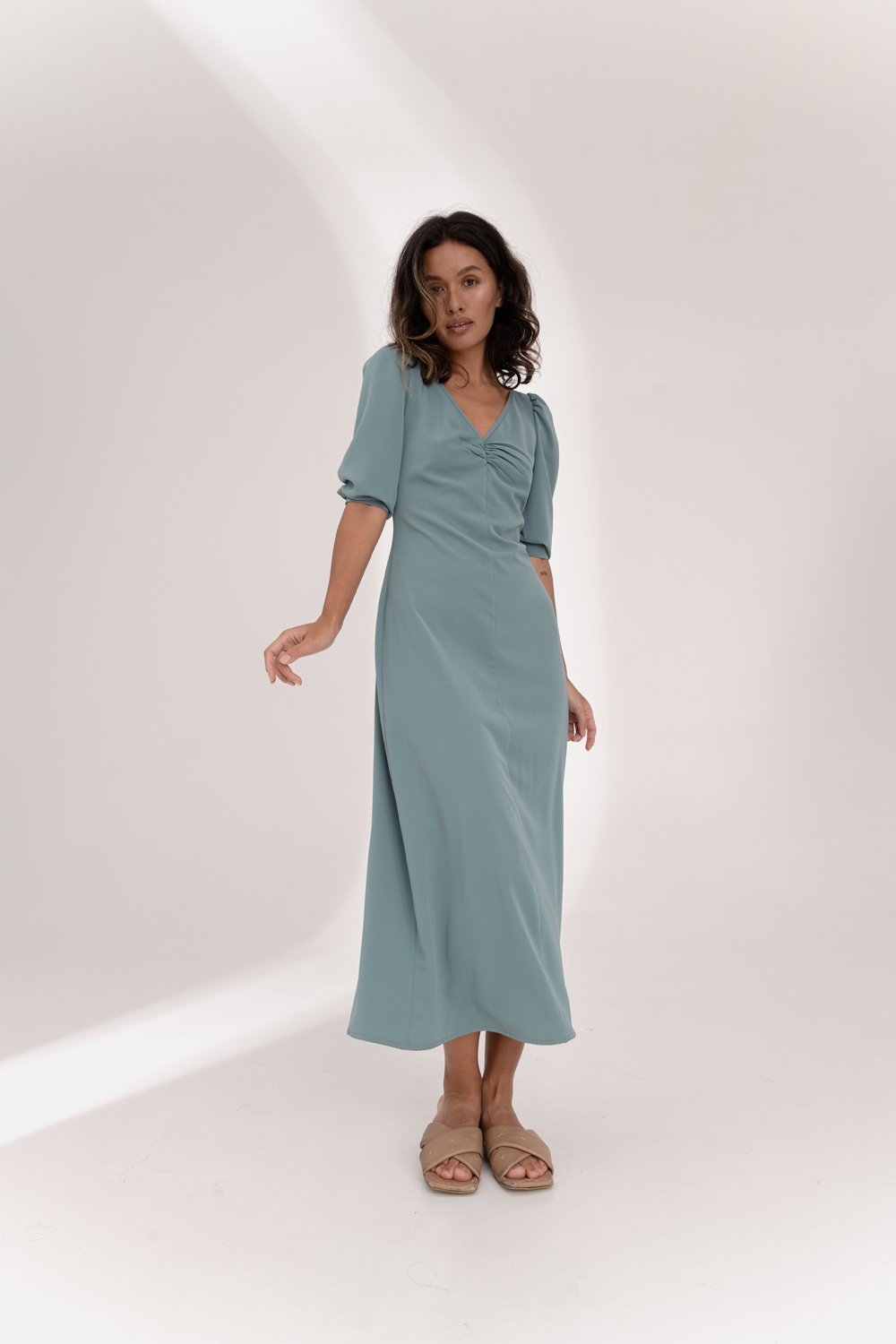 Green flowy dress with ruching at the chest