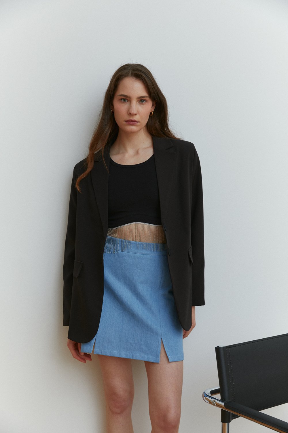 Light blue denim miniskirt with elegant front slits
