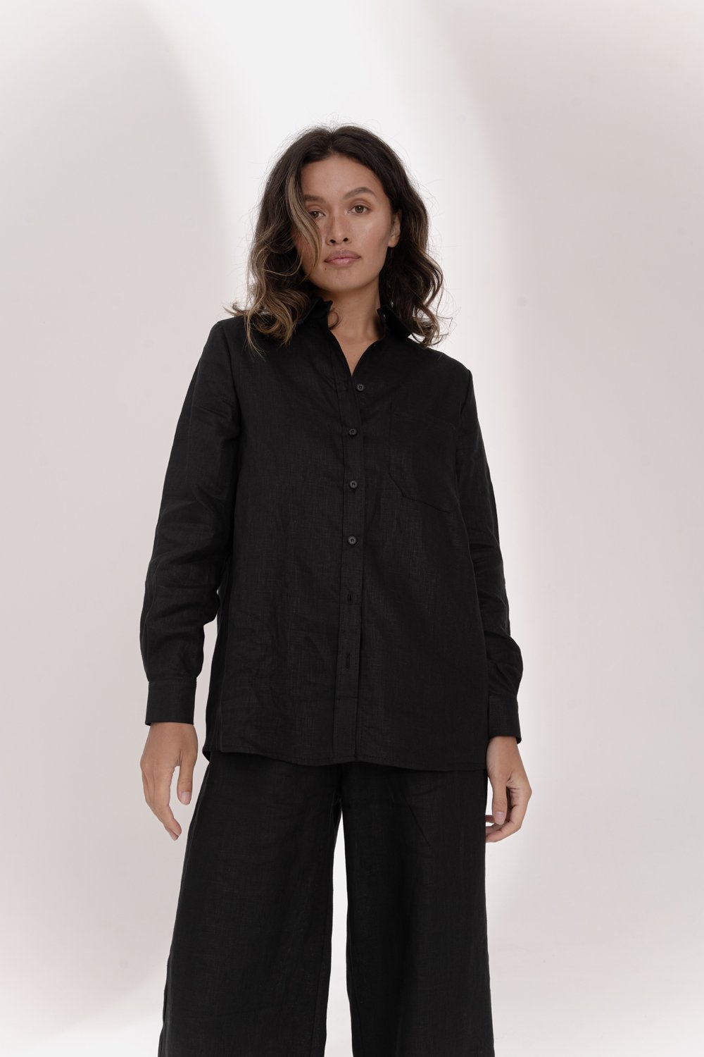 Black linen blouse with loose fit