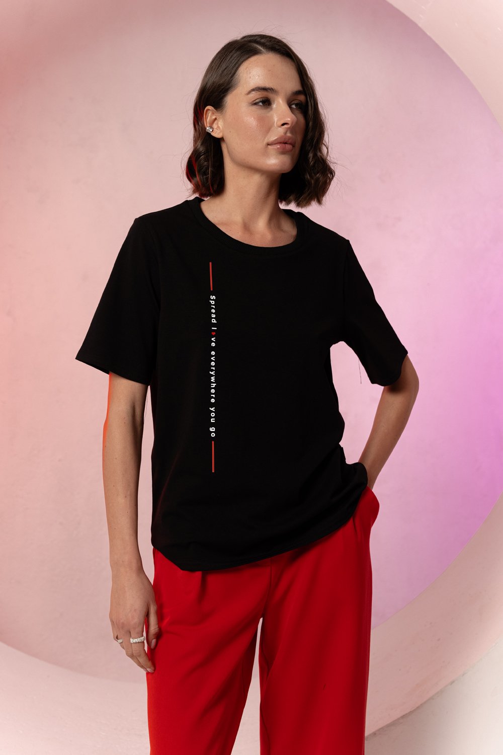 Black straight t-shirt with vertical lettering