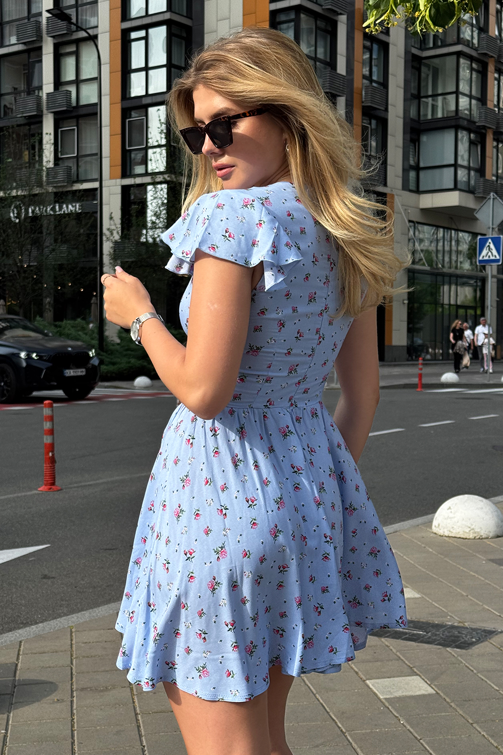 Light blue fitted dress with cap sleeves