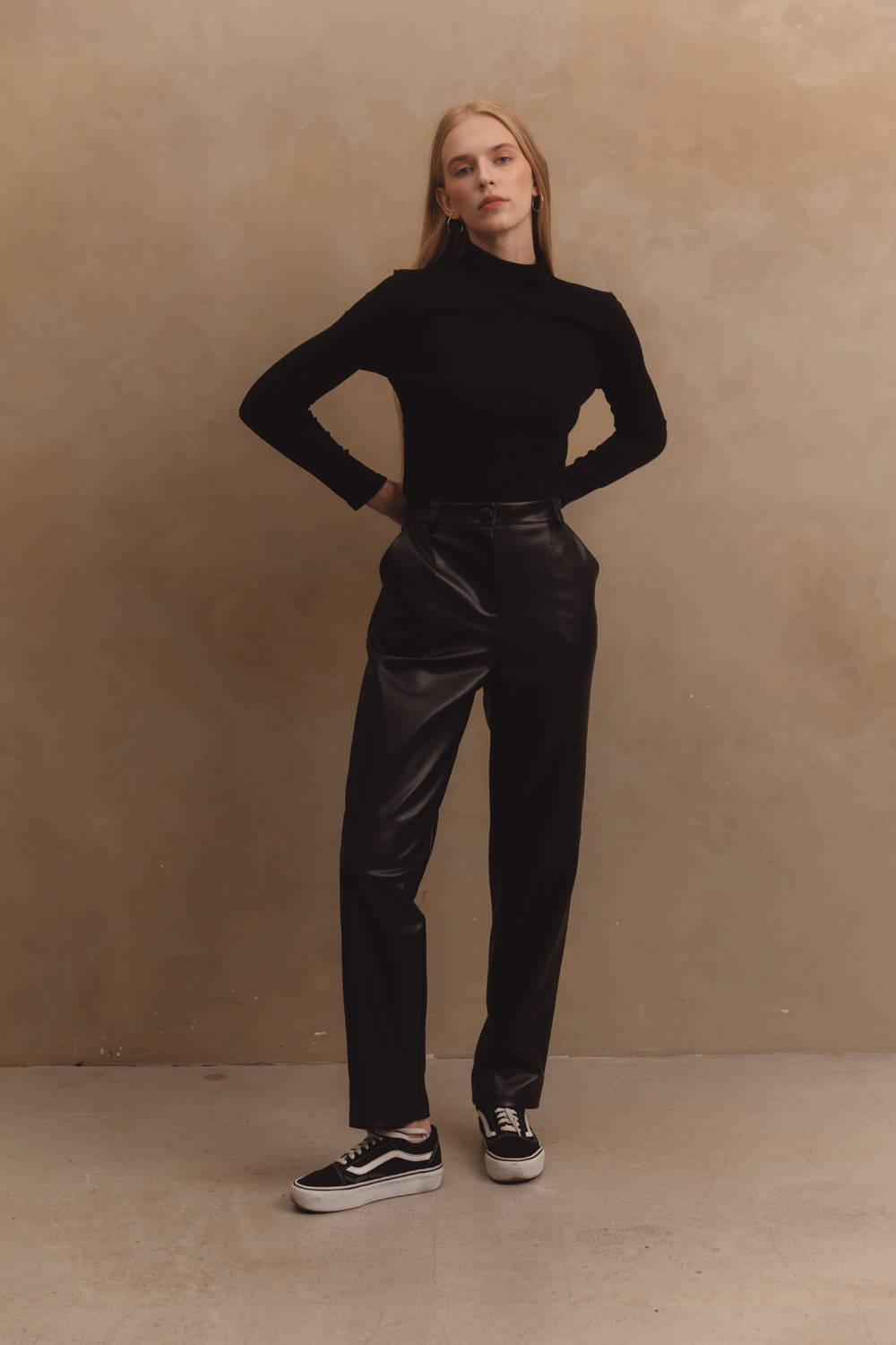 Black straight trousers in eco-leather