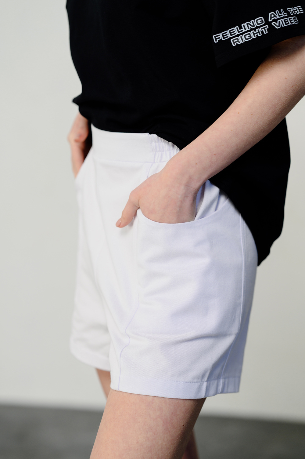 White loose shorts with elastic waistband