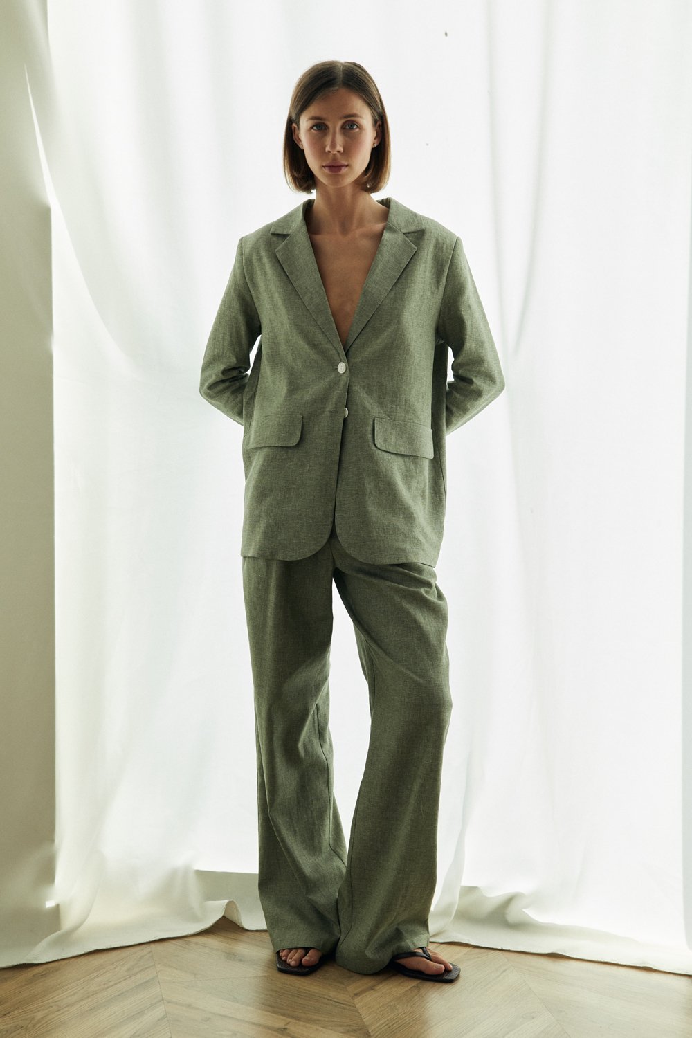 Wide-leg linen trousers in olive color
