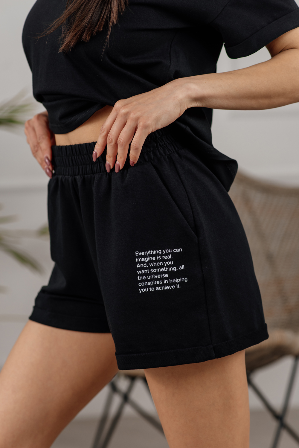 Black jersey suit with shorts