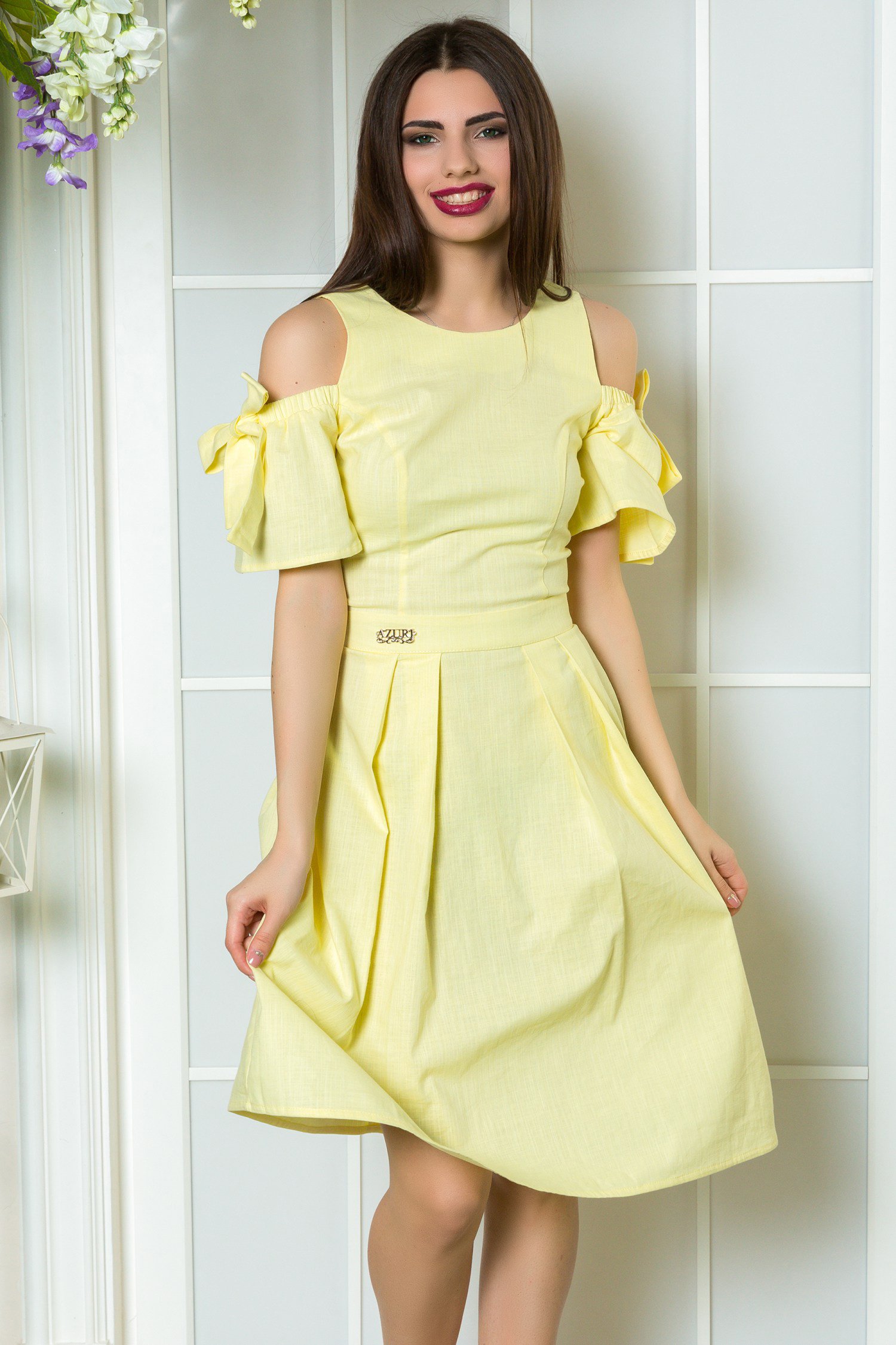 Yellow linen dress with bare shoulders