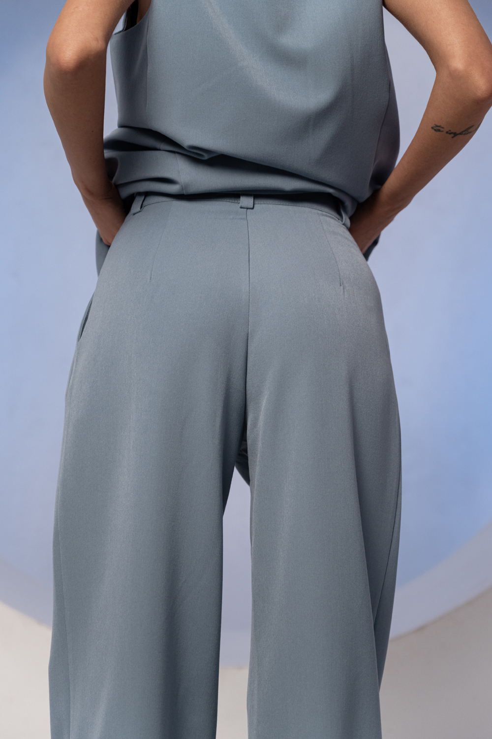 Gray-blue wide trousers with a belt