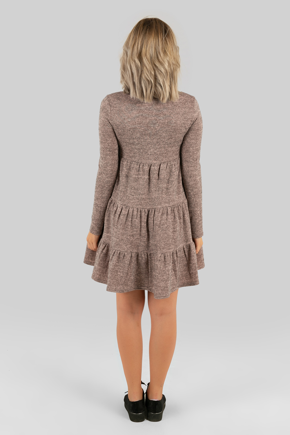 Knitted dress with ruffles in angora in powder colour