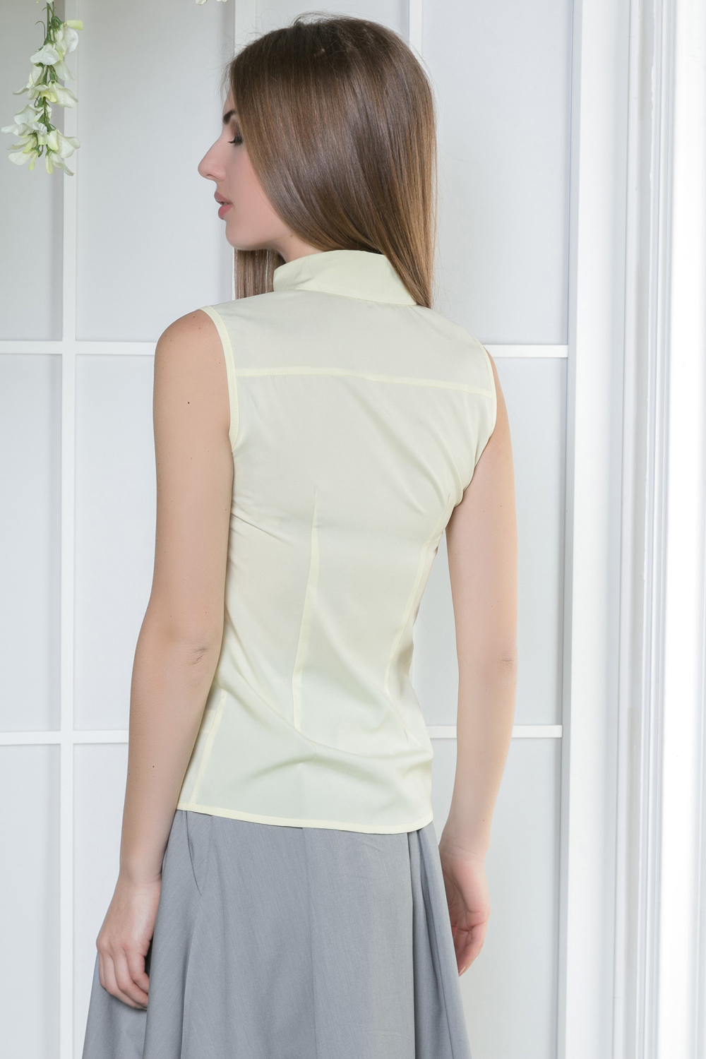 Yellow sleeveless blouse