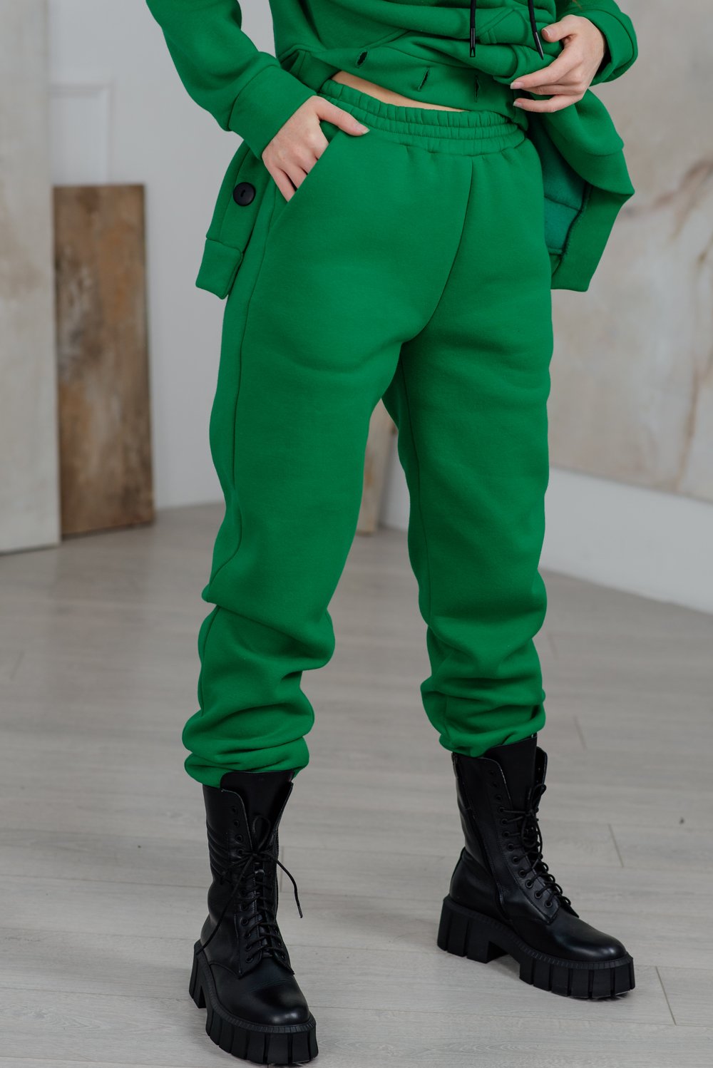 Green elasticated track pants