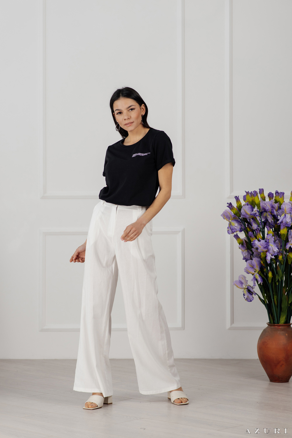 White linen trousers with tucks 