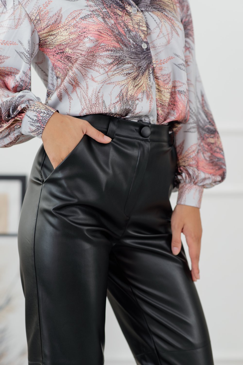 Black loose trousers made of eco leather