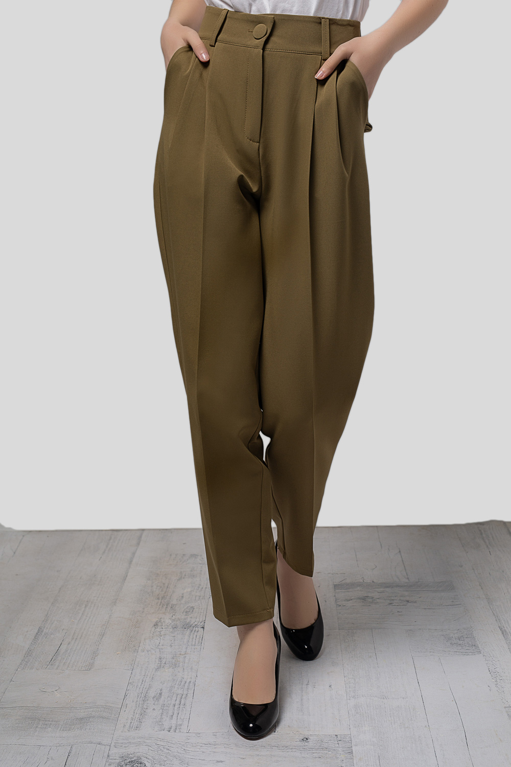 Khaki color darted trousers