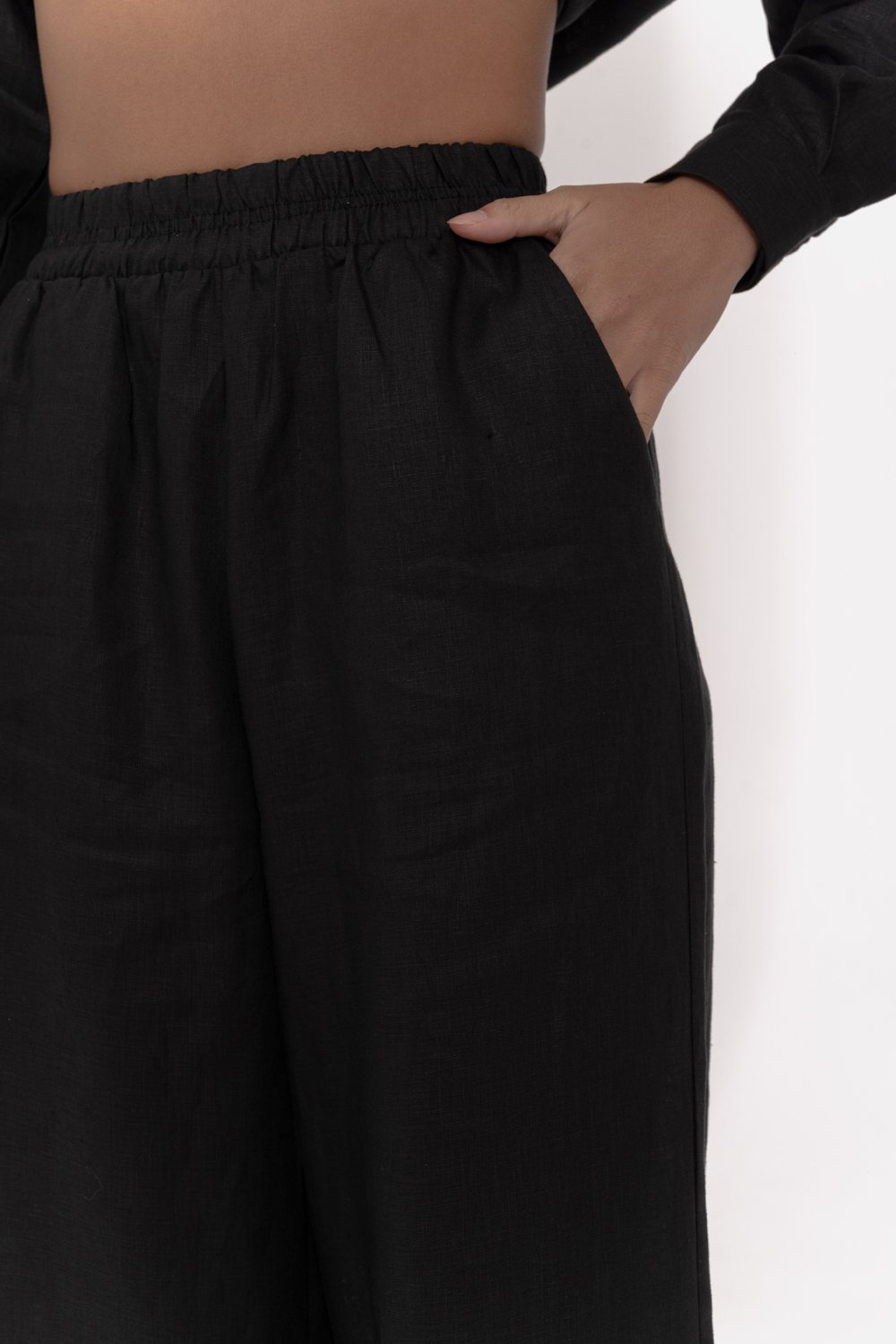 Black linen trousers with elastic waistband