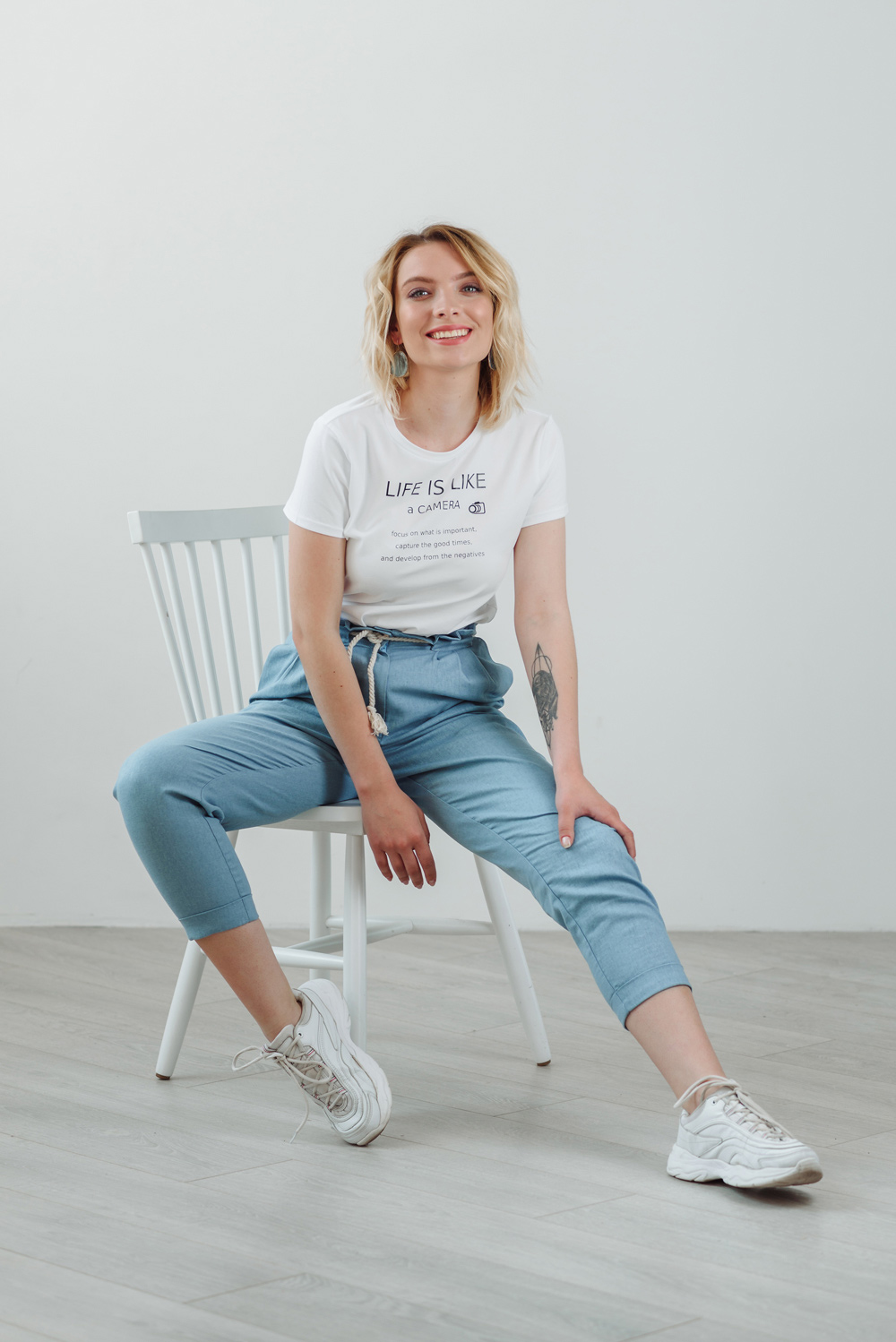 White T-shirt with a slogan 