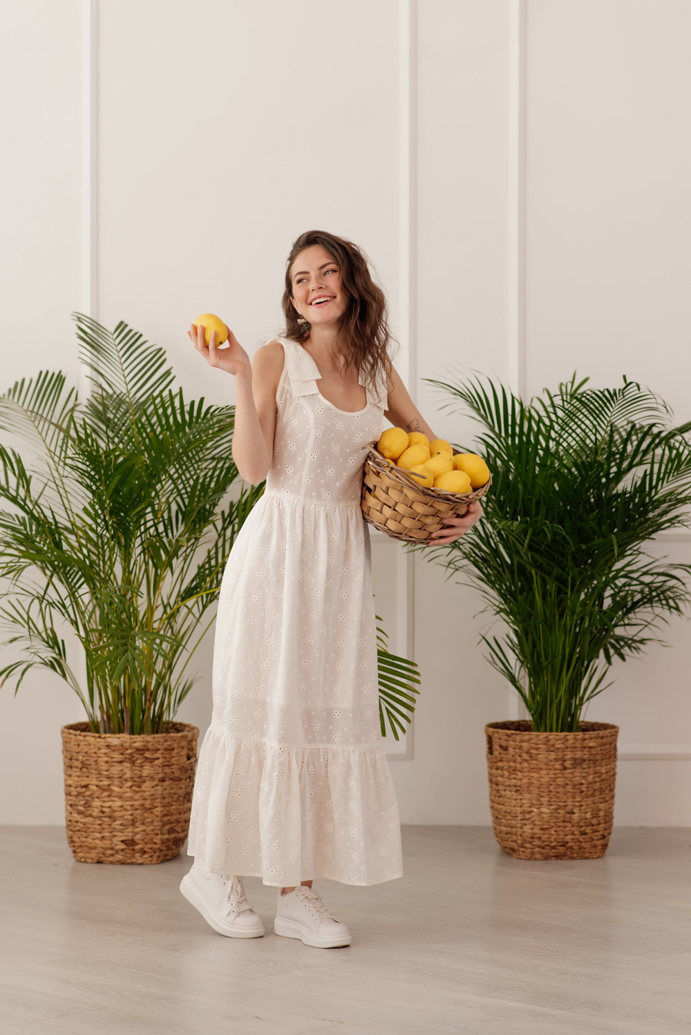 Long white dress with cutwork embroidery