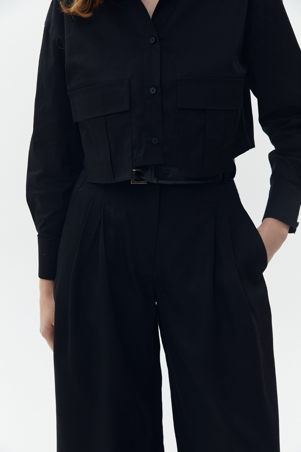 Чорні брюки-палаццо з кишенями