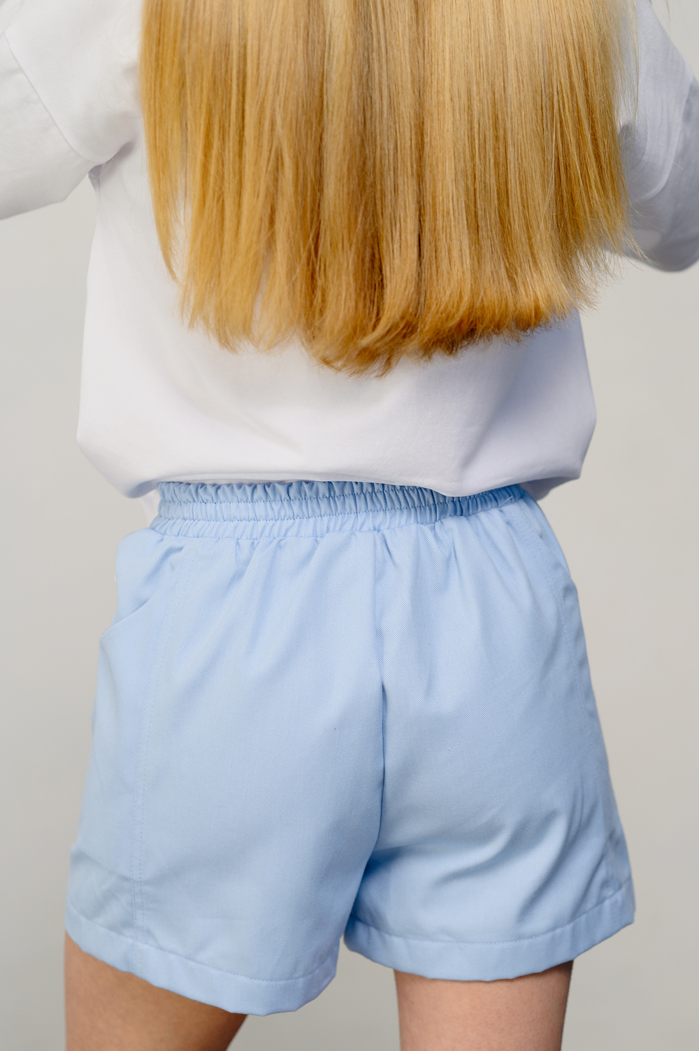 Light blue loose shorts with elastic waistband