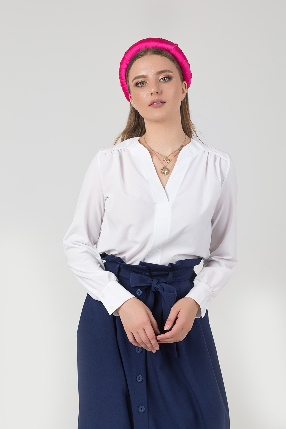 Blouse with a neckline and folds