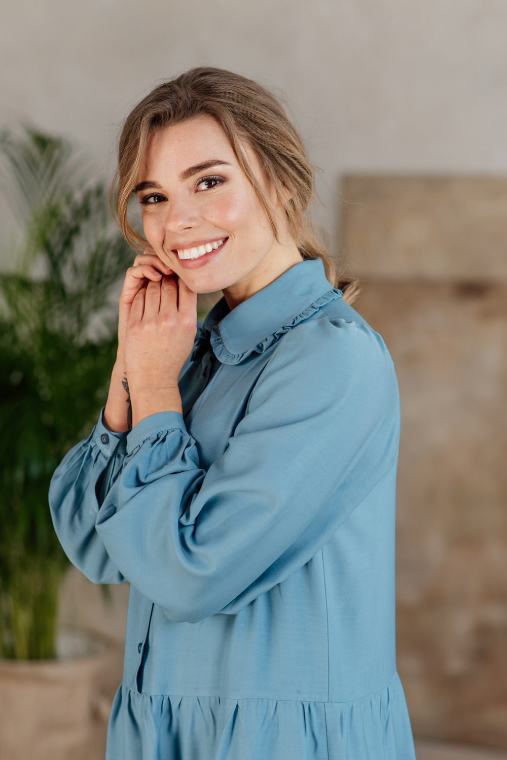 Blue dress with ruffles and collar