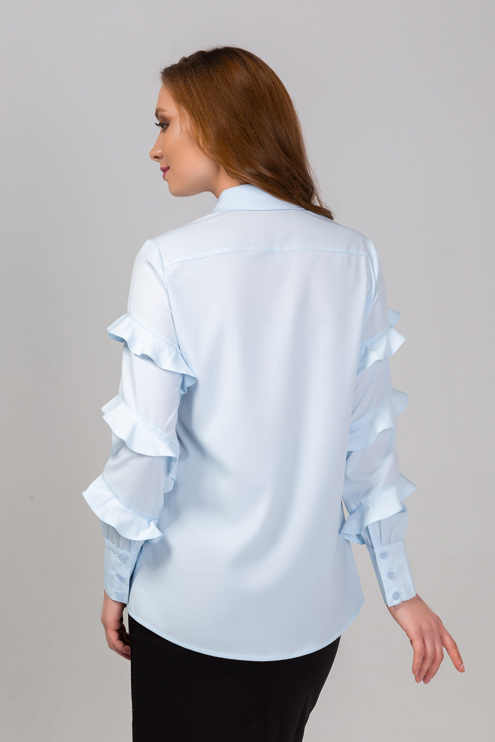 Delicate blouse with ruffles
