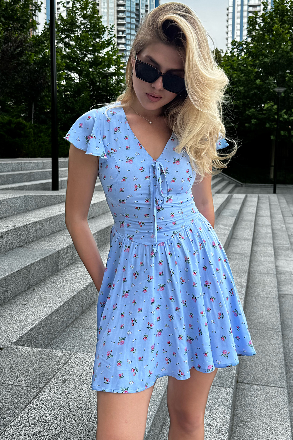 Light blue fitted dress with cap sleeves