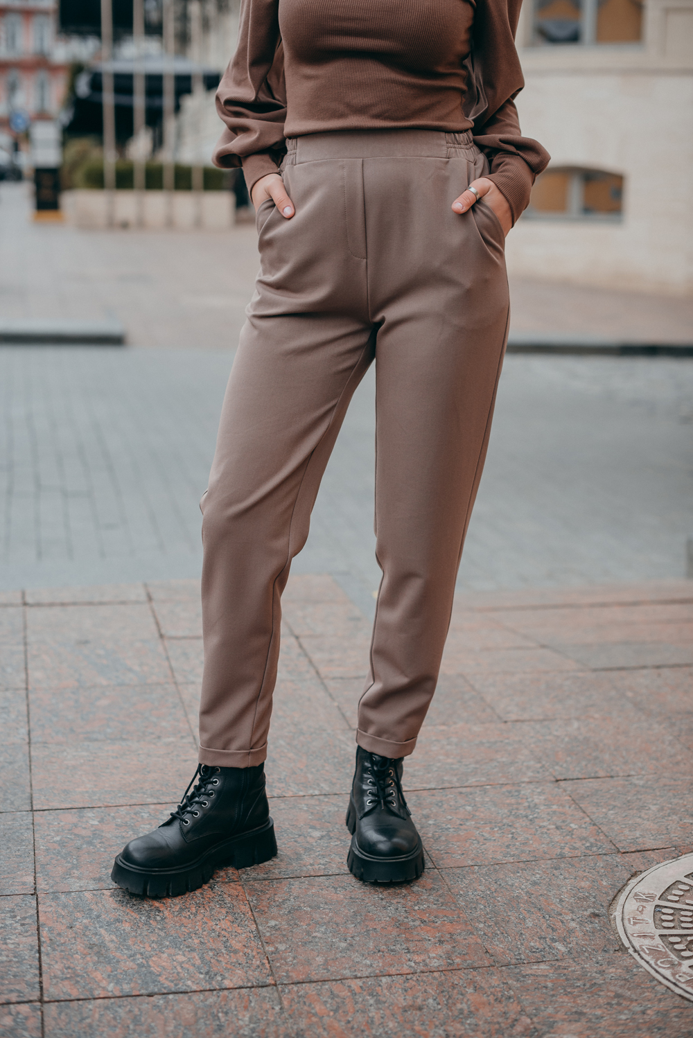 Beige elasticated trousers with cuffs