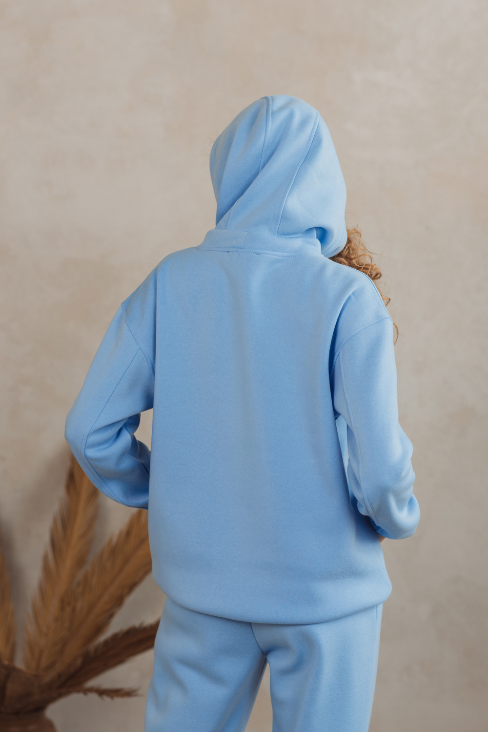 Light blue sweatshirt with a hood