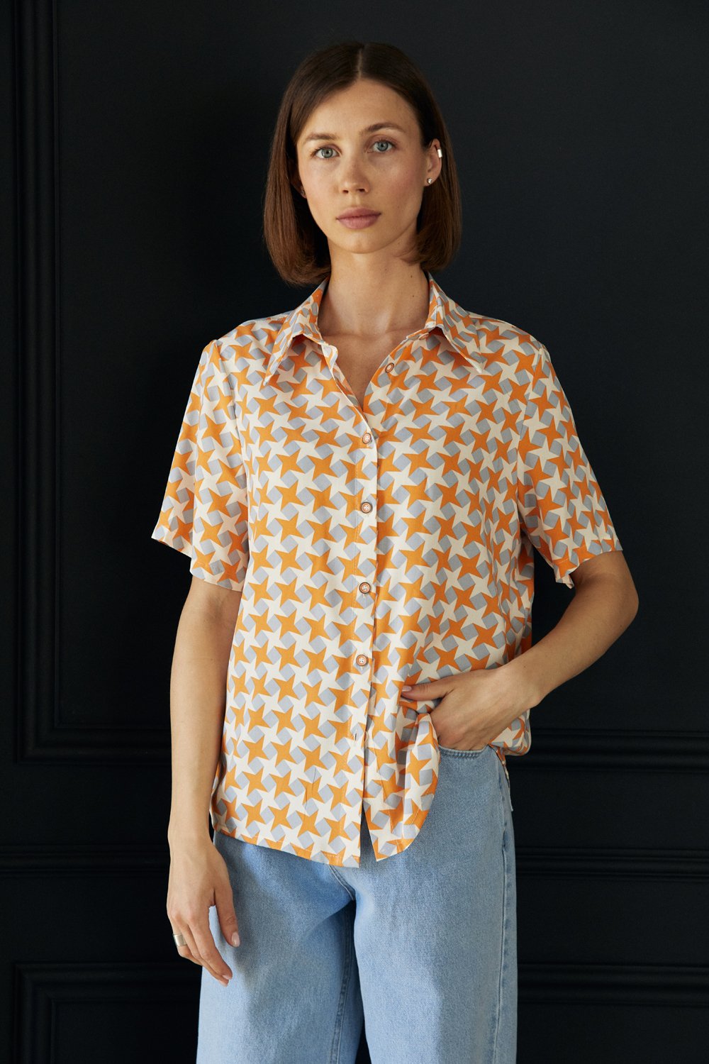 Помаранчева блуза вільного крою з короткими рукавами