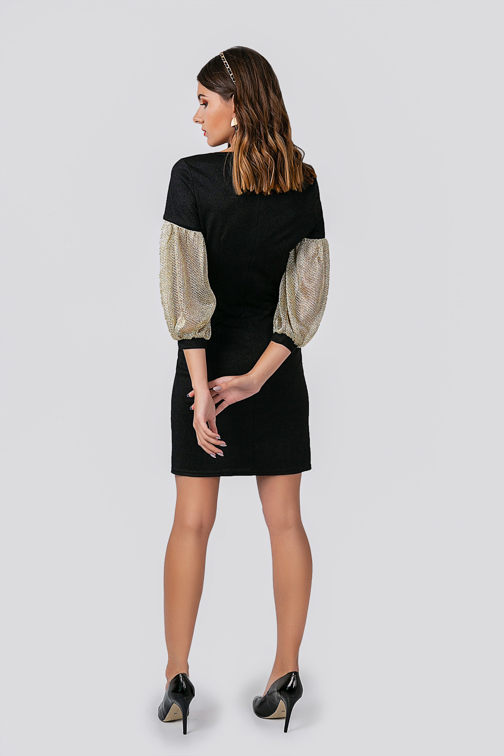 Dress with gold sleeves