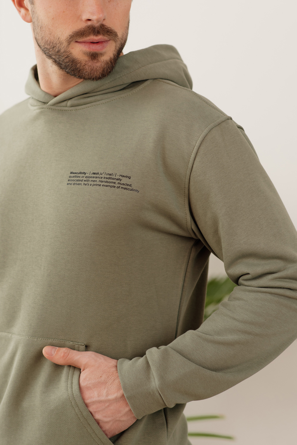 Khaki sweatshirt with slogan and kangaroo pocket